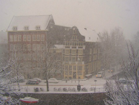 A white, snow covered Amsterdam